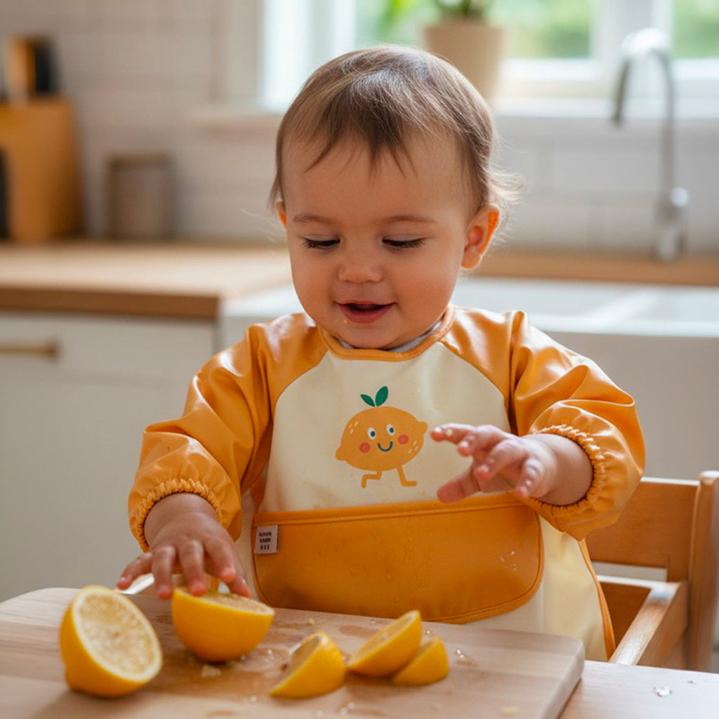 Les Petits Citrons Le Repas Maé Lätzchen mit Ärmeln S-L